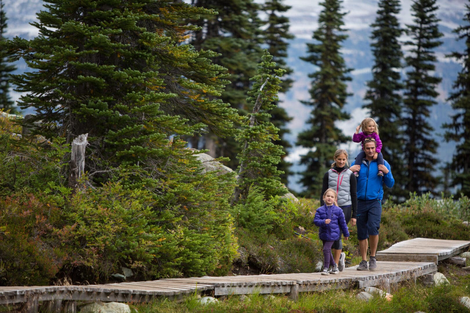 An adventurous family head out on a hike in a wilderness area, Canada